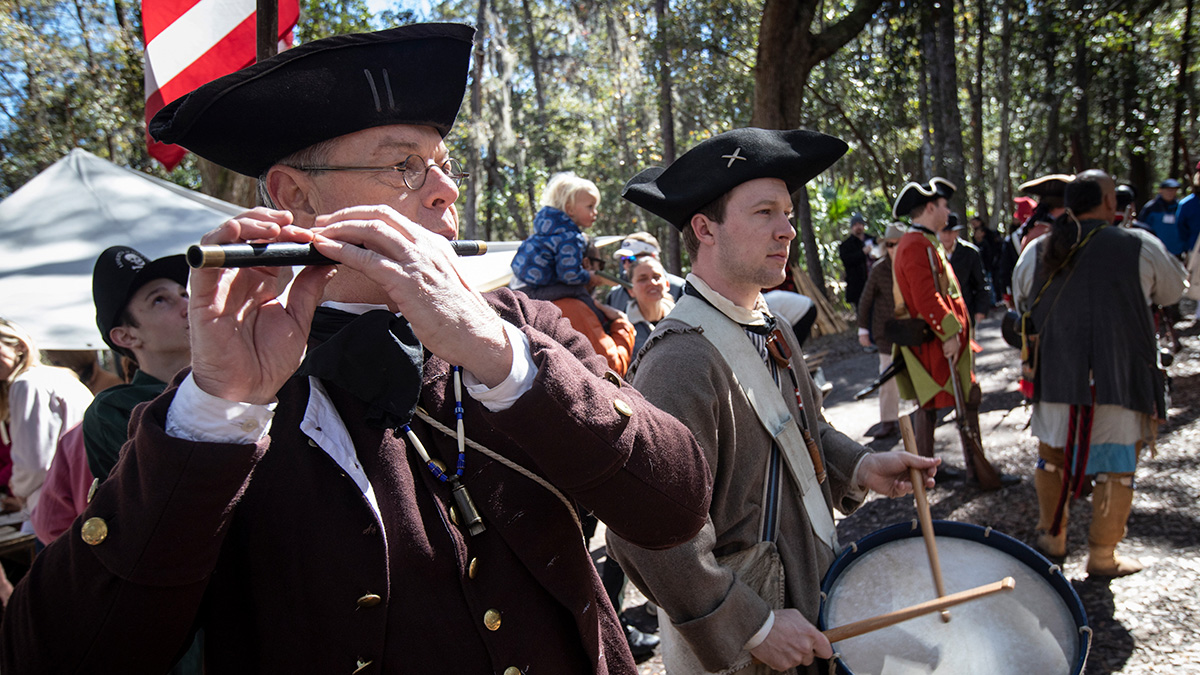 Historical interpretors and visitors at the Georgia History Festival's Colonial Faire and Muster